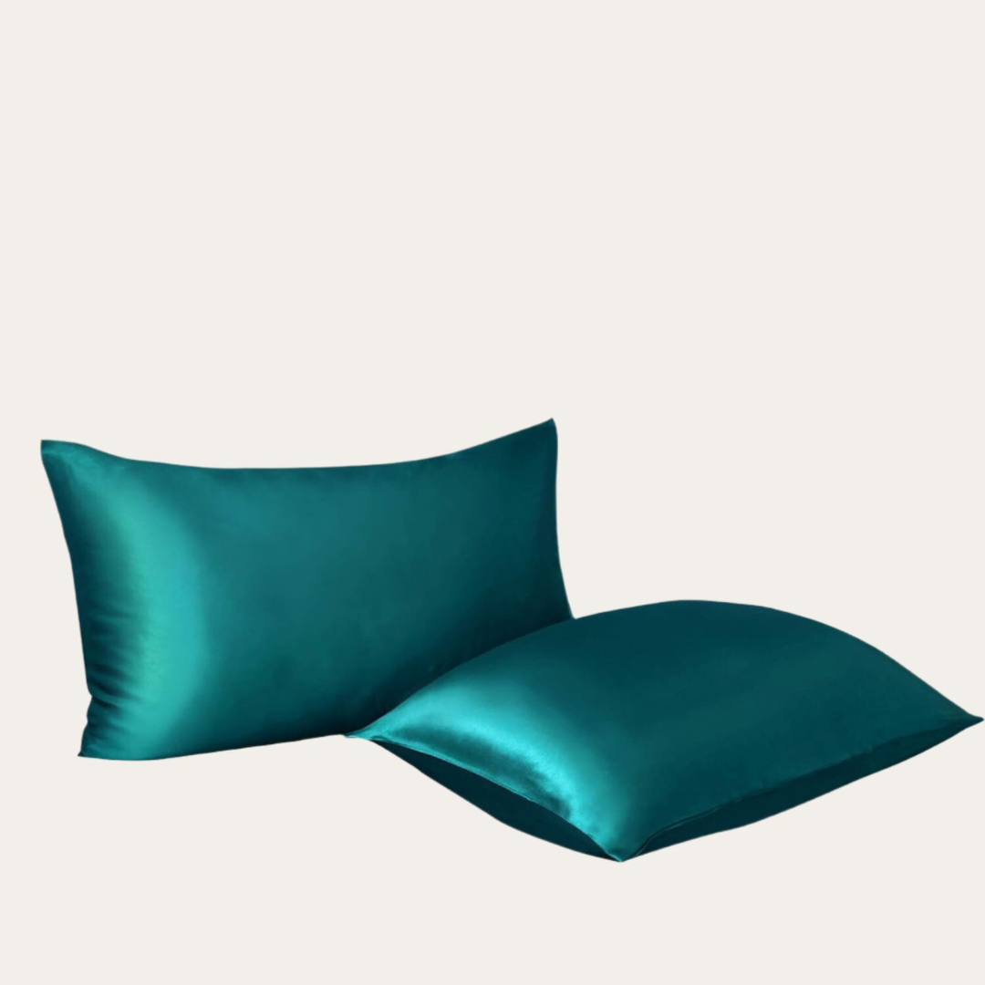 VibeCore Aesthetic Sleek Satin Duvet Cover Set teal pillowcases, designed with a smooth, luxurious satin finish to add elegance and comfort to your bedroom or dorm decor.