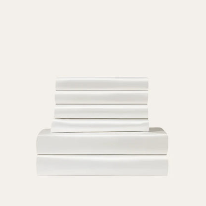 VibeCore Aesthetic Sleek Satin Duvet Cover Set in white, showcasing the complete sheet package including duvet cover, flat sheet, and pillowcases, designed for a luxurious and smooth bedroom and dorm experience.
