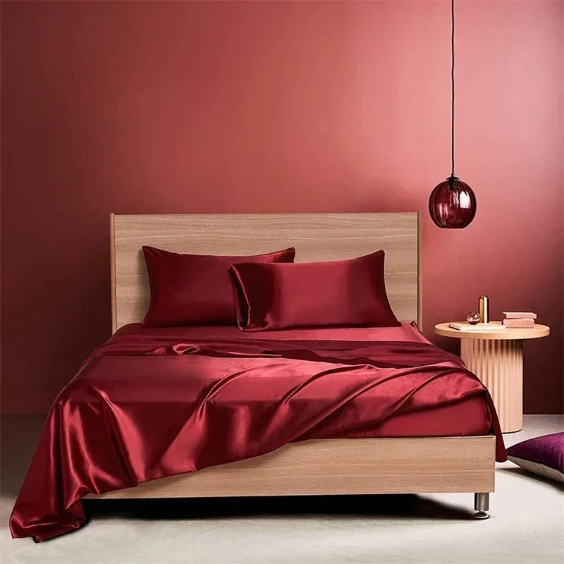 Front view of the VibeCore Aesthetic Sleek Satin Duvet Cover Set in wine red, highlighting its luxurious satin finish and rich color, perfect for adding sophistication to any bedroom or dorm.
