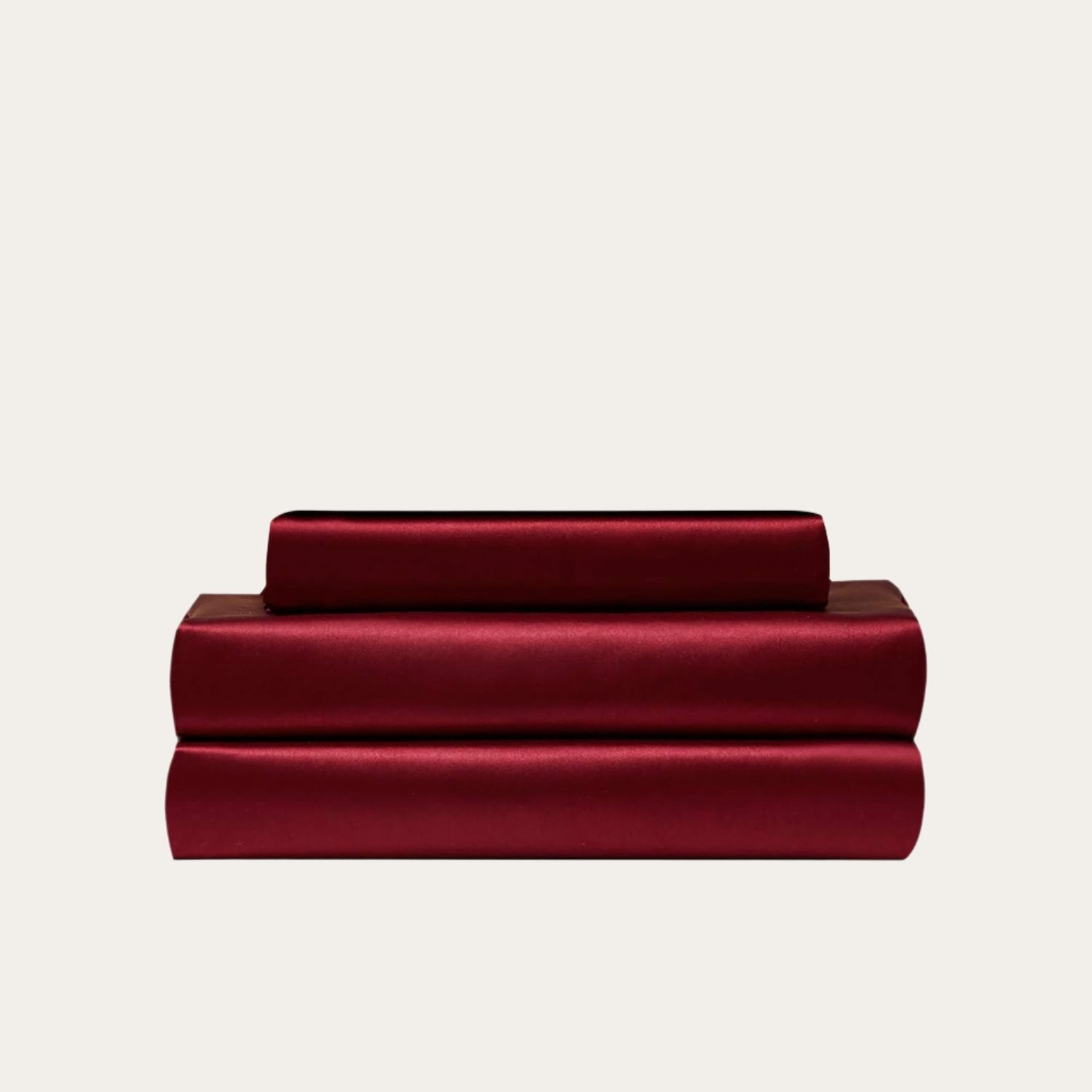 VibeCore Aesthetic Sleek Satin Duvet Cover Set in wine red, showcasing the complete sheet package including duvet cover, flat sheet, and pillowcases, designed for a luxurious and smooth bedroom and dorm experience.
