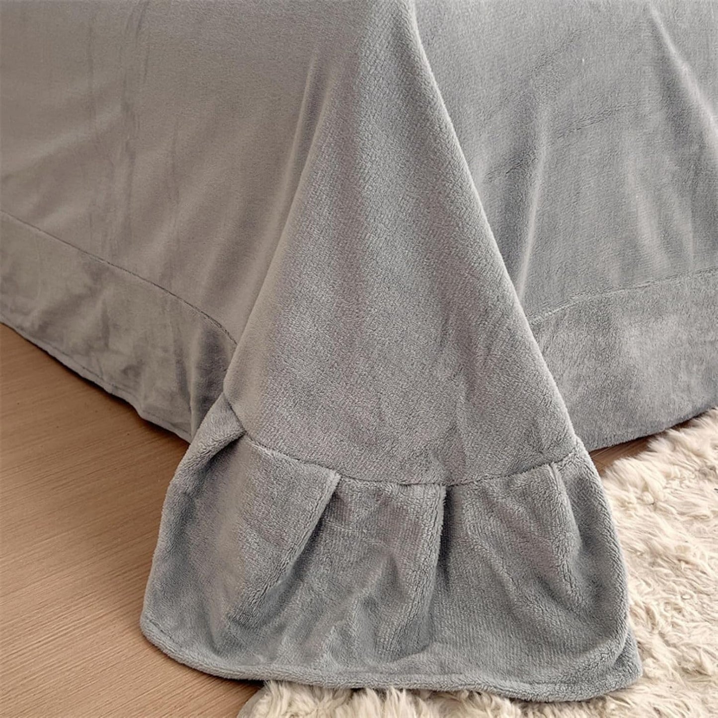 Close-up of the plush sheet in the VibeCore Snuggle Supreme Bedding Set in Light Gray, showcasing its ultra-soft, breathable fabric for added comfort and luxury.