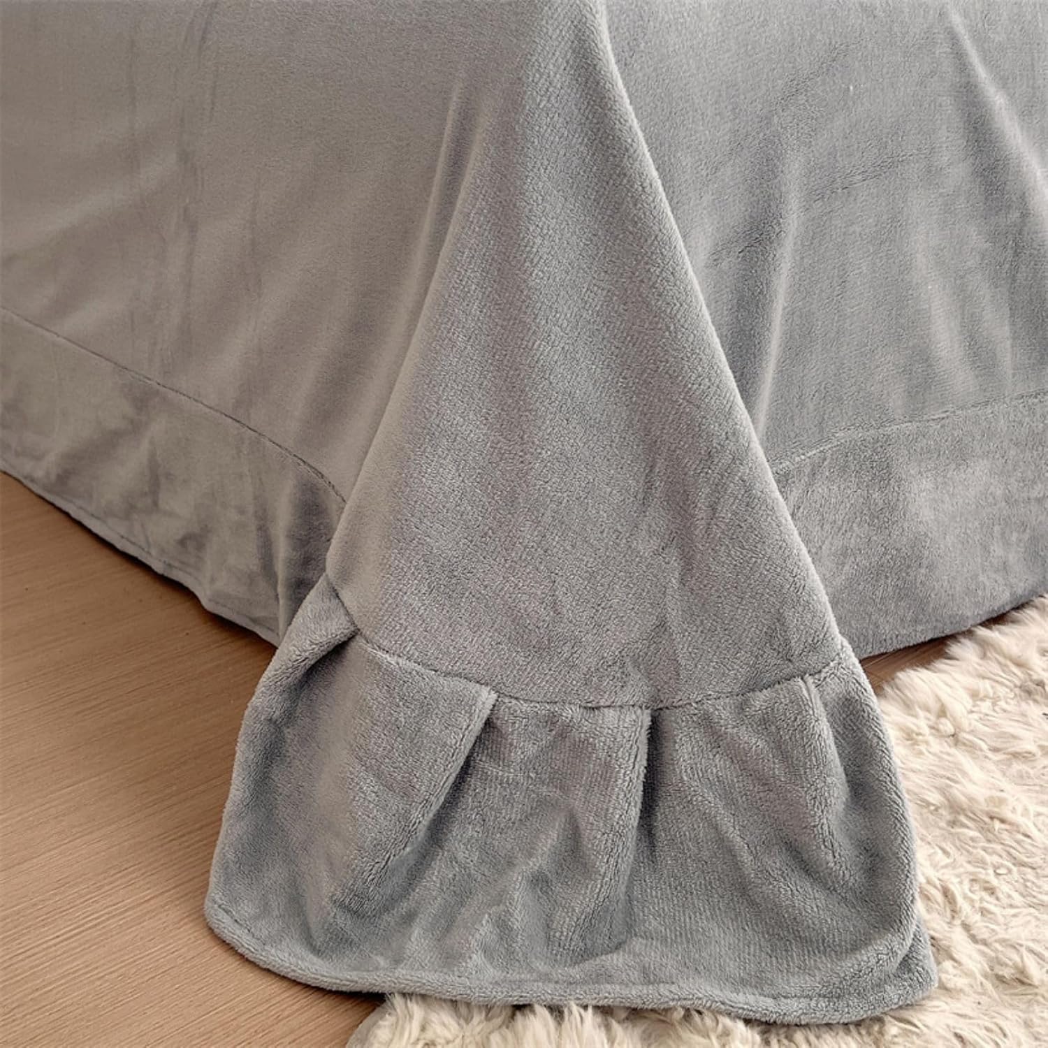 Close-up of the plush sheet in the VibeCore Snuggle Supreme Bedding Set in Light Gray, showcasing its ultra-soft, breathable fabric for added comfort and luxury.