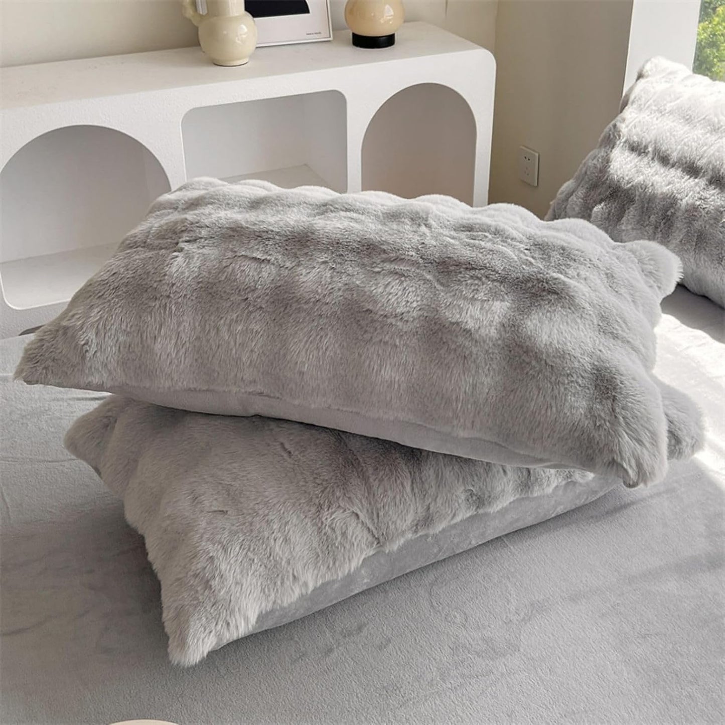 Close-up of the pillow covers from the VibeCore Snuggle Supreme Bedding Set in color Light Gray, showcasing the luxurious tufted design and ultra-soft milk fibre fabric that provides a cozy, breathable, and hypoallergenic sleep experience.