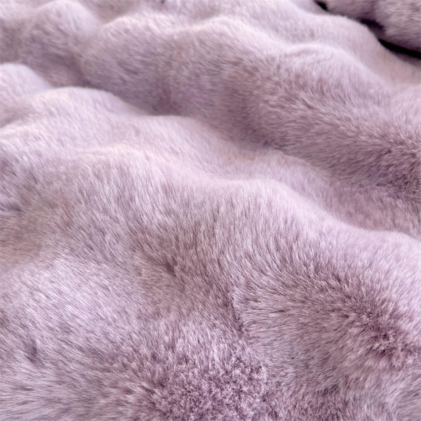Close-up of the plush material used in the VibeCore Snuggle Supreme Bedding Set in the color Lilac, highlighting the ultra-soft, breathable milk fibre fabric that offers luxurious comfort and a hypoallergenic sleep experience.