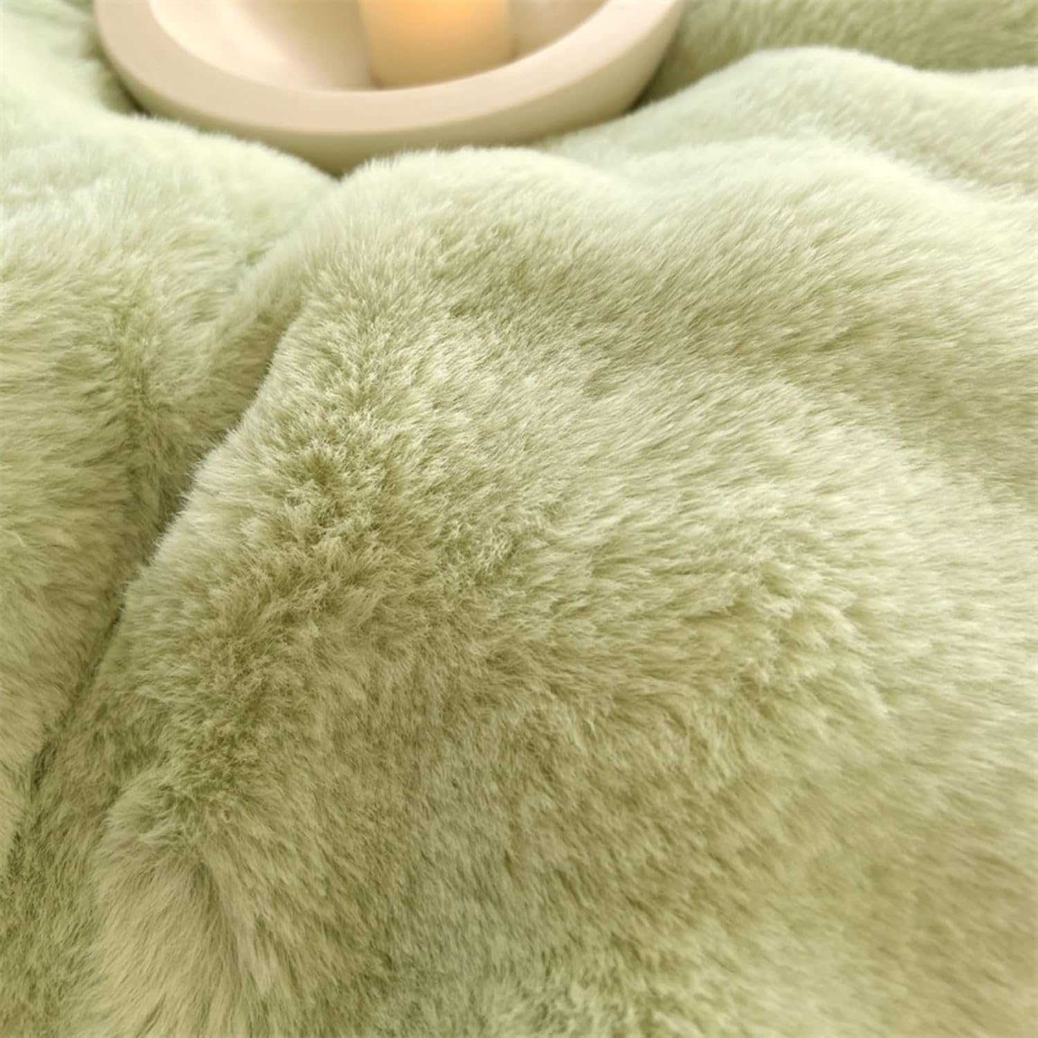 Close-up of the plush material used in the VibeCore Snuggle Supreme Bedding Set in the color Matcha Green, highlighting the ultra-soft, breathable milk fibre fabric that offers luxurious comfort and a hypoallergenic sleep experience.