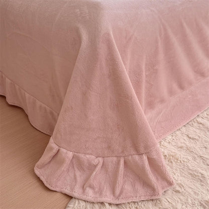 Close-up of the plush sheet in the VibeCore Snuggle Supreme Bedding Set in Rose, showcasing its ultra-soft, breathable fabric for added comfort and luxury.