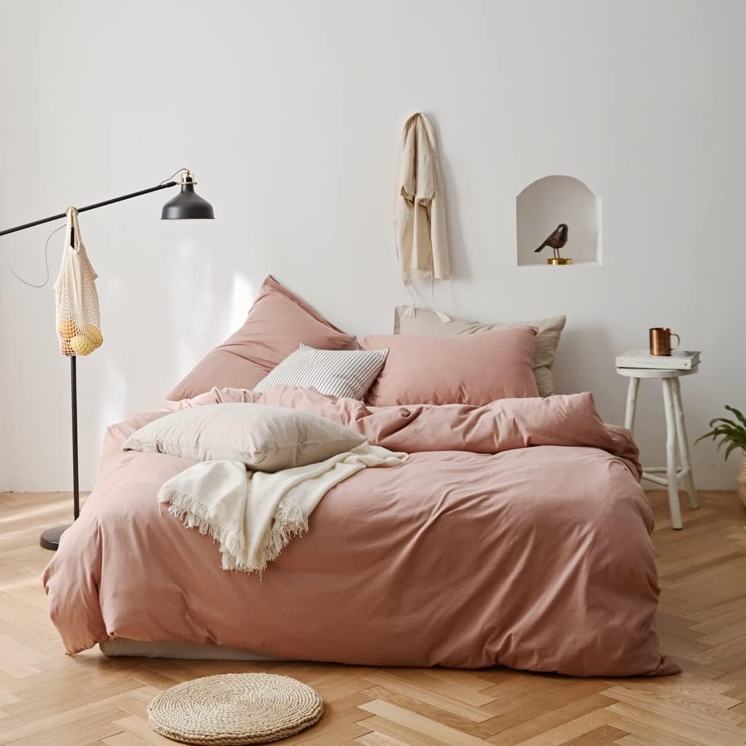Aerial view of the VibeCore Aesthetic Solid Comfort Duvet Cover Set in Baby Pink, showcasing the smooth, soft fabric and its serene pastel shade, perfect for creating a cozy, minimalist bedroom or dorm vibe.