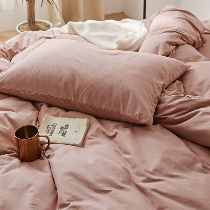 Close-up of the Baby Pink pillowcase from the VibeCore Aesthetic Solid Comfort Duvet Cover Set, showcasing its soft, smooth texture and serene pastel shade for a cozy, soothing sleep experience.