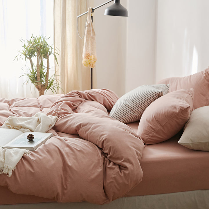 VibeCore Aesthetic Solid Comfort Duvet Cover Set Baby Pink side view, showcasing the soft, blush pink hue and smooth, contemporary design of the duvet cover, adding a warm, cozy vibe to any bedroom or dorm.