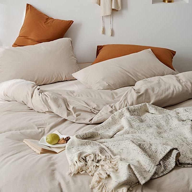Aerial close-up of the VibeCore Aesthetic Solid Comfort Duvet Cover Set in Beige, showcasing the soft, premium texture and vibrant hue that brings warmth and sophistication to any space.