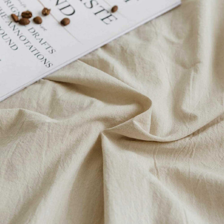Close-up of the VibeCore Aesthetic Solid Comfort Duvet Cover Set in Beige, showcasing the soft, high-quality fabric that ensures both comfort and durability for a perfect night's sleep.