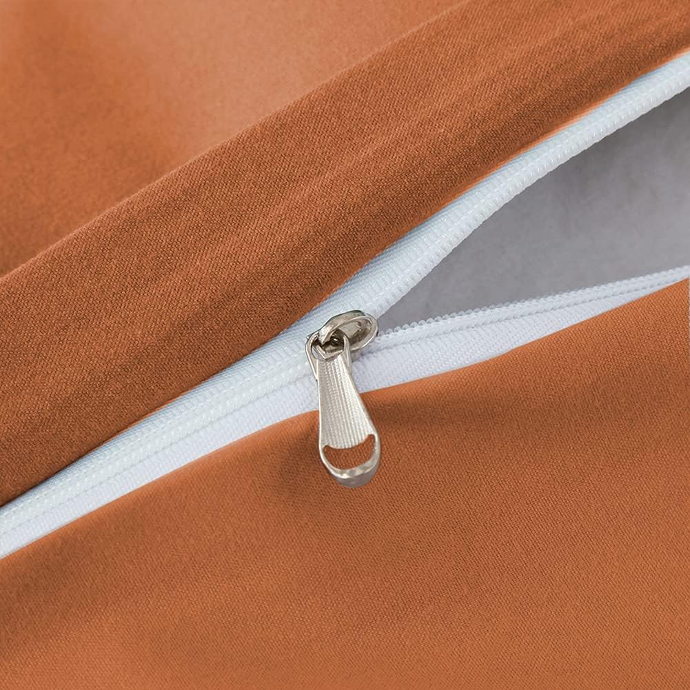 Close-up of the zipper detail on the VibeCore Aesthetic Solid Comfort Duvet Cover Set in Burnt Orange, showcasing its seamless functionality and durable craftsmanship.