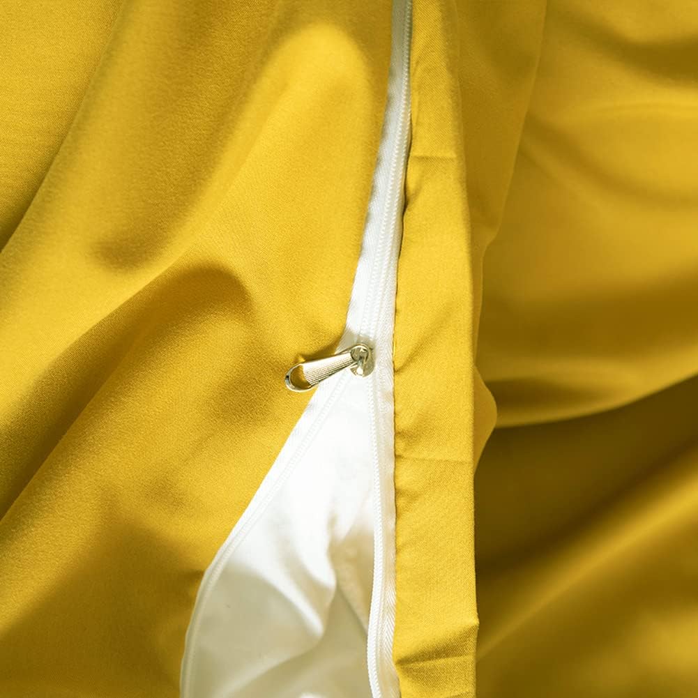 VibeCore Aesthetic Solid Comfort Duvet Cover Set in Mustard Yellow, featuring a sleek zipper closure for easy use. The soft, breathable fabric provides a cozy yet stylish addition to your bedroom or dorm decor.