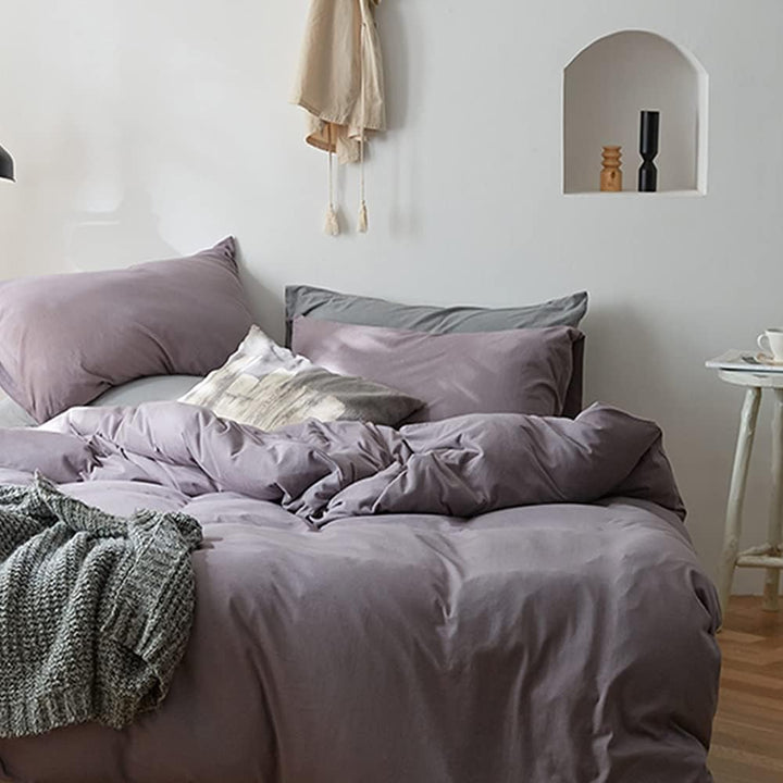 VibeCore Aesthetic Solid Comfort Duvet Cover Set in Purple Gray, captured from the front right to showcase the rich color and smooth, luxurious texture. Perfect for creating a cozy and stylish bedroom or dorm.