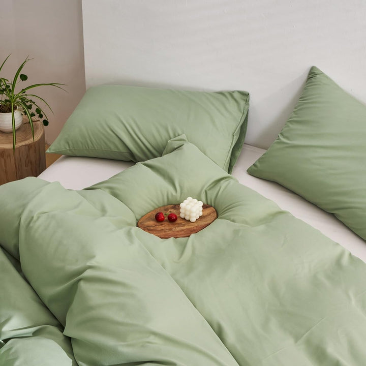 Aerial close-up of the VibeCore Aesthetic Solid Comfort Duvet Cover Set in Sage, showcasing the soft, premium texture and vibrant hue that brings warmth and sophistication to any space.