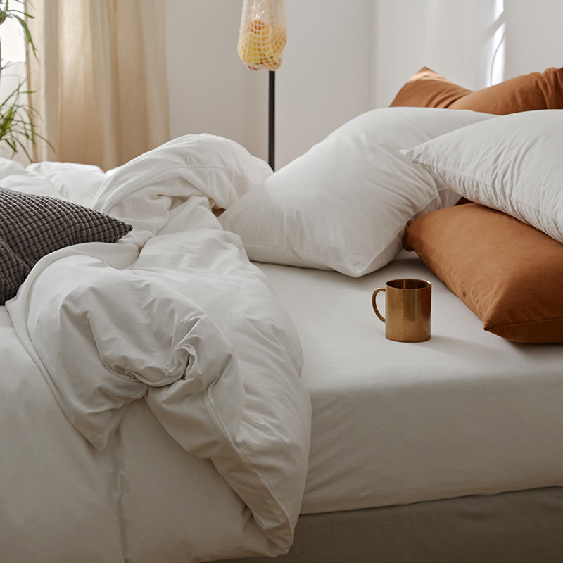 VibeCore Aesthetic Solid Comfort Duvet Cover Set in White offers a clean, fresh look with a soft, smooth texture. Its minimalist design brings a touch of elegance to any room, making it the ideal choice for a serene and cozy sleep environment.