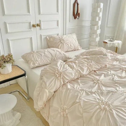 Close-up aerial view of the VibeCore Aesthetic Tufted Floral Pattern Duvet Cover Set in beige, highlighting the soft, textured floral pattern that creates a cozy and stylish atmosphere, perfect for adding a modern, aesthetic touch to your bedroom or dorm decor.