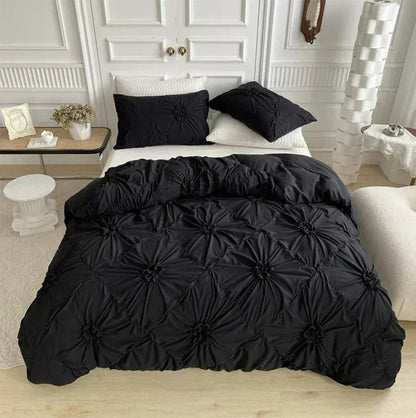 Aerial view of the VibeCore Aesthetic Tufted Floral Pattern Duvet Cover Set in black, showcasing its soft, textured floral blooms and sleek design that adds a cozy yet modern touch to any bedroom or dorm, creating an aesthetic and inviting atmosphere.