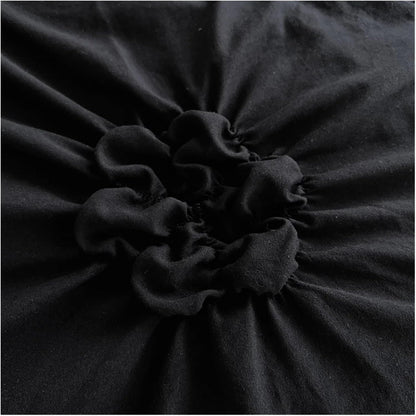 Close-up view of the tufted floral design on the VibeCore Aesthetic Tufted Floral Pattern Duvet Cover Set in black, showcasing the intricate texture of the plush, 3D flowers that add a cozy, stylish touch to your bedding and elevate your room decor.