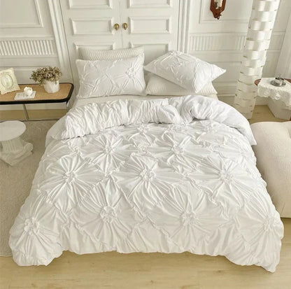 Aerial view of the VibeCore Aesthetic Tufted Floral Pattern Duvet Cover Set in white, showcasing its soft, textured floral blooms and sleek design that adds a cozy yet modern touch to any bedroom or dorm, creating an aesthetic and inviting atmosphere.
