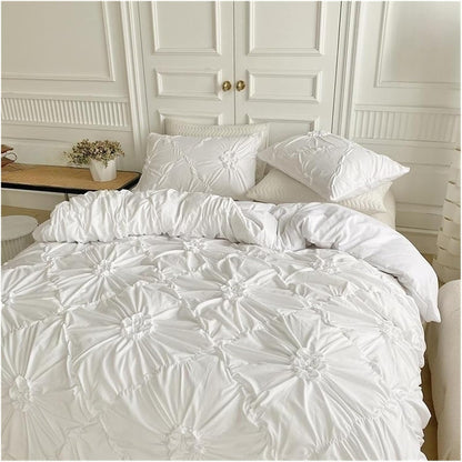 Front aerial view of the VibeCore Aesthetic Tufted Floral Pattern Duvet Cover Set in white, featuring soft, textured blooms and a modern design that brings a cozy yet stylish vibe to your bedroom or dorm, perfectly showcasing its plush tufted details.