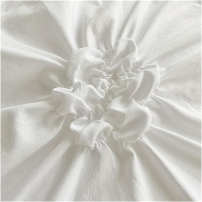 Close-up view of the tufted floral design on the VibeCore Aesthetic Tufted Floral Pattern Duvet Cover Set in white, showcasing the intricate texture of the plush, 3D flowers that add a cozy, stylish touch to your bedding and elevate your room decor.