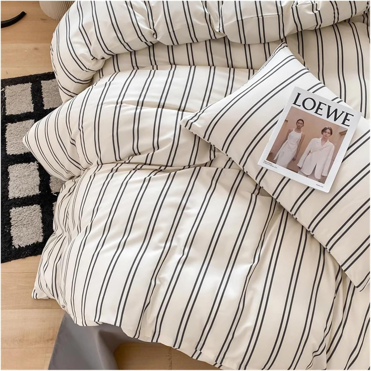 Close-up of the black and white stripe pattern on the pillow cover and duvet cover of the 'VibeCore Urban Stripe Bedding Set,' showcasing the crisp, modern lines and soft fabric. The sleek design adds a minimalist yet stylish touch to the bedding.