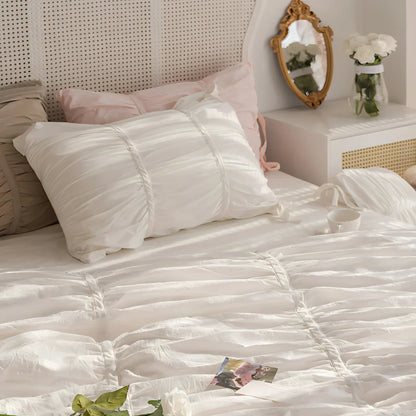Close-up of the pillowcase from the VibeCore White Timeless Elegance Pleated Bedding Set, showcasing the delicate pleated design and soft, luxurious fabric for a refined and elegant look.