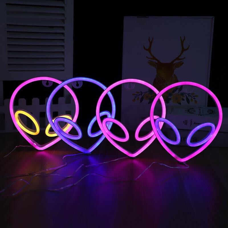 VibeCore Alien Neon Light in 4 colors: Pink & Yellow, Purple, Pink, and Pink & Purple. This neon sign creates a cool, glowing ambiance, adding a quirky, out-of-this-world touch to any space. Perfect for bedrooms, dorms, or lounges, it brings fun and personality to your room’s decor.