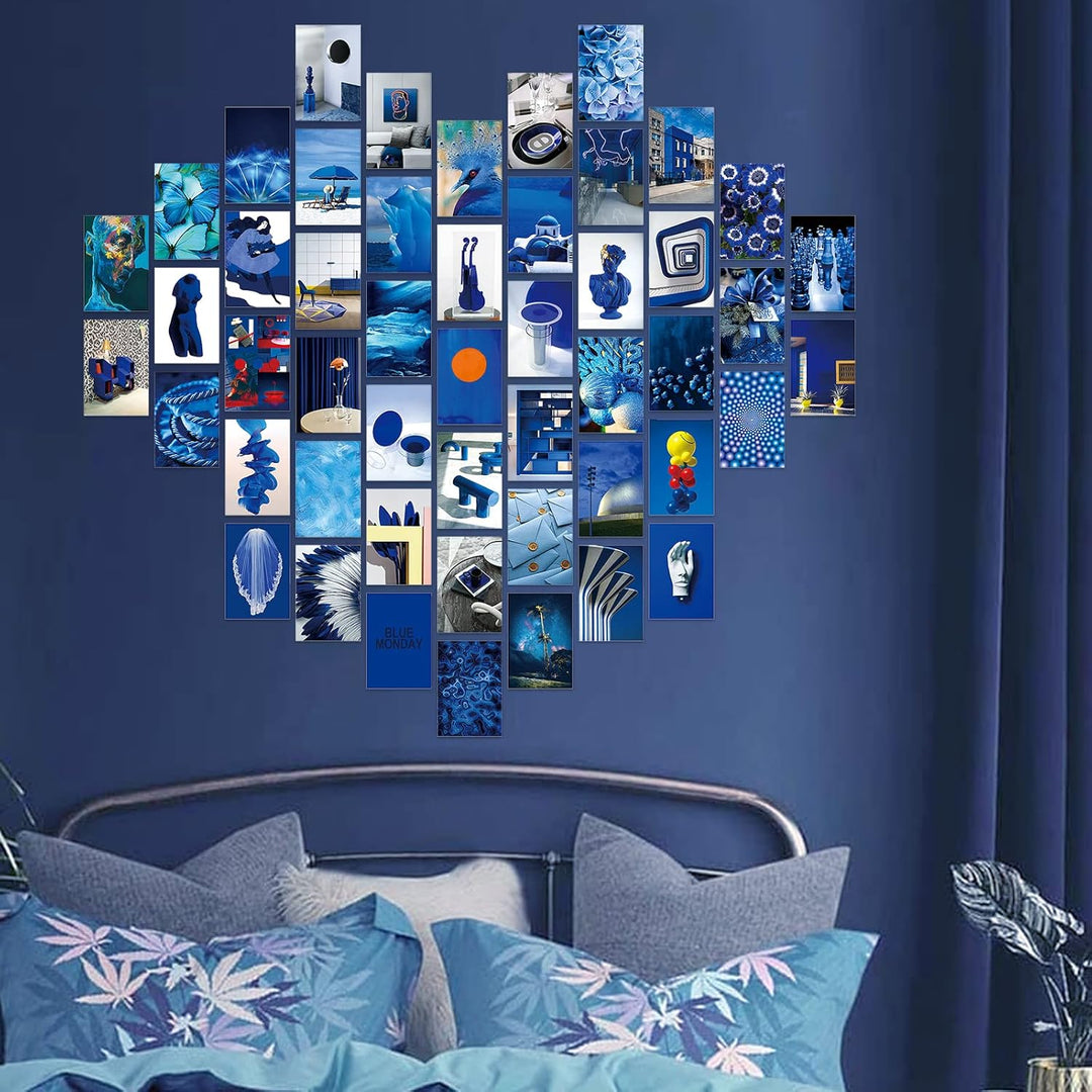 VibeCore Artsy Deep Blue Wall Collage Kit displayed above a bed, featuring 70 stunning prints in deep blue tones and sophisticated photography. Creates a creative and serene ambiance in the bedroom.