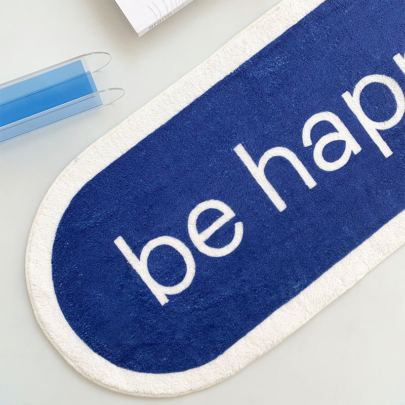 Close-up view of the VibeCore Be Happy iMessage Accent Rug, showcasing its vibrant blue design inspired by iMessage. The soft, fluffy texture and non-slip backing are clearly visible, making it a cozy and stylish addition to any room.