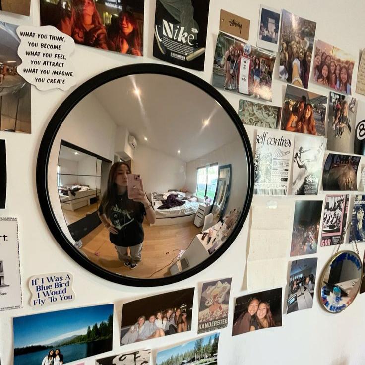 VibeCore Black Convex Traffic Mirror in bedroom, featuring a bold black frame and wide-angle lens. This grunge-style convex mirror adds a unique fish-eye view, enhancing visibility and creating an urban, retro vibe. Ideal for modern bedroom decor, it blends style and function with a sleek, industrial touch.