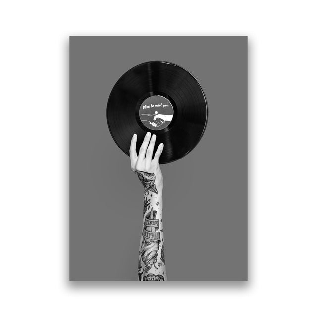 VibeCore Black & White Vinyl Canvas Prints Option A: Tattooed arm holding a vinyl record in black and white