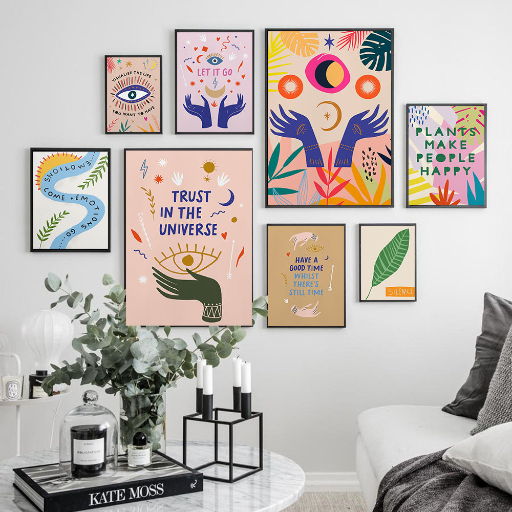 VibeCore Boho Spiritual Canvas Prints on wall in living room.
