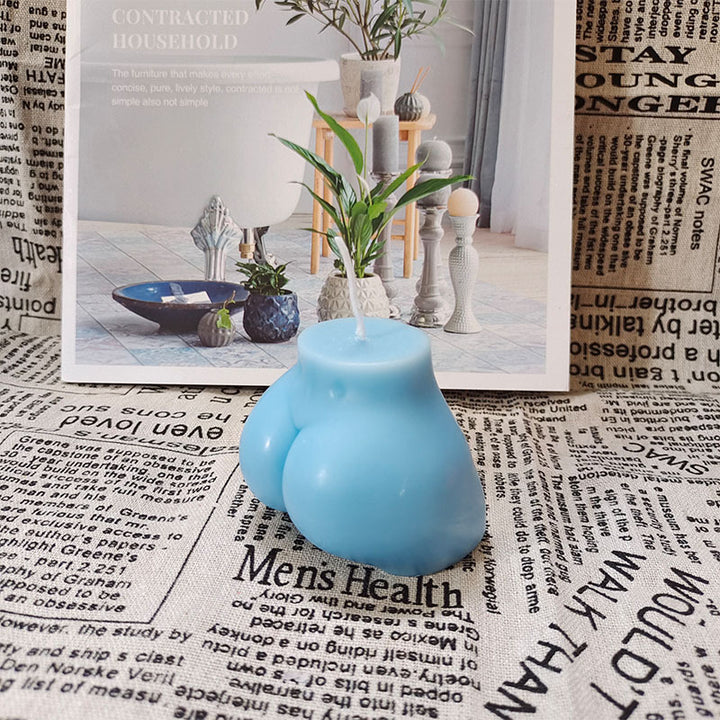 Crafted from premium soybean wax, this playful candle features a curvaceous bottom shape in a vibrant blue hue, adding a quirky touch to any room with its fun design and aromatic bliss.