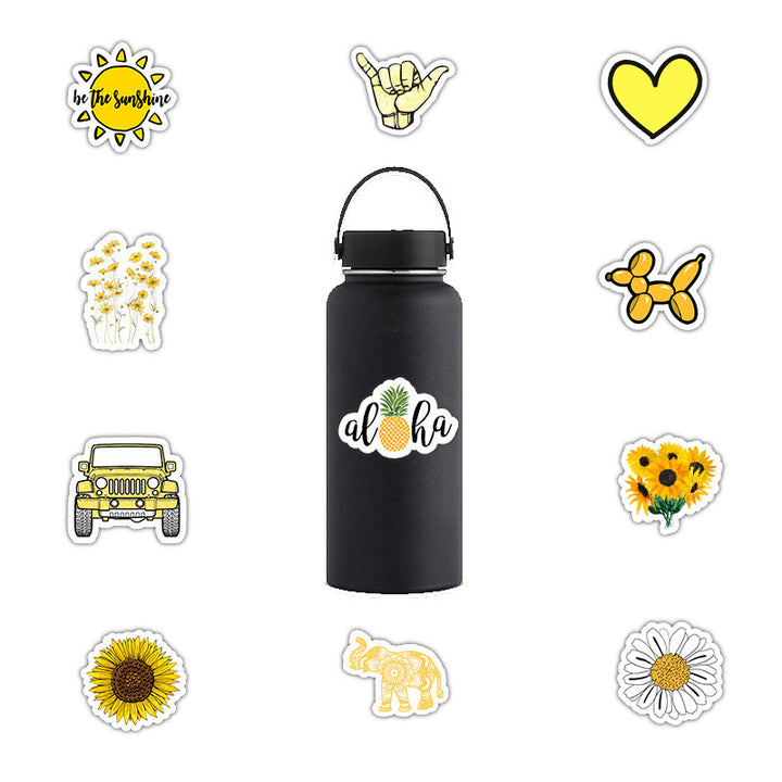 VibeCore Bright Yellow Stickers close-up and sticker on water bottle, showcasing vibrant designs with trendy phrases and cute drawings. Perfect for personalization.
