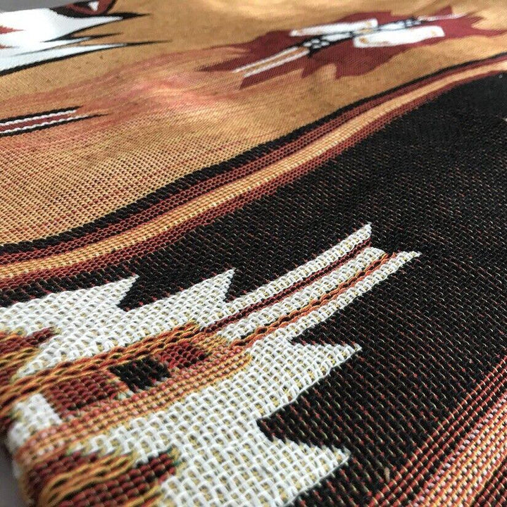 VibeCore Brown Aztec Woven Blanket material close-up, highlighting the tribal-inspired design and soft, breathable 100% combed cotton. Showcasing its intricate weave and high-quality texture for a cozy, durable feel.