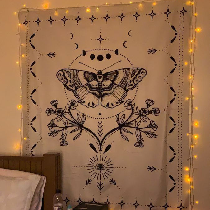 VibeCore Butterfly Tarot Tapestry On Wall With Lights Around It
