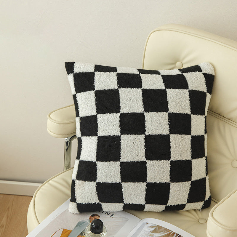 VibeCore Checkerboard Throw Pillow Cover in black, featuring a bold, timeless checkerboard pattern. Made from a soft polyester-cotton blend, it adds a chic, modern touch to any couch or room.