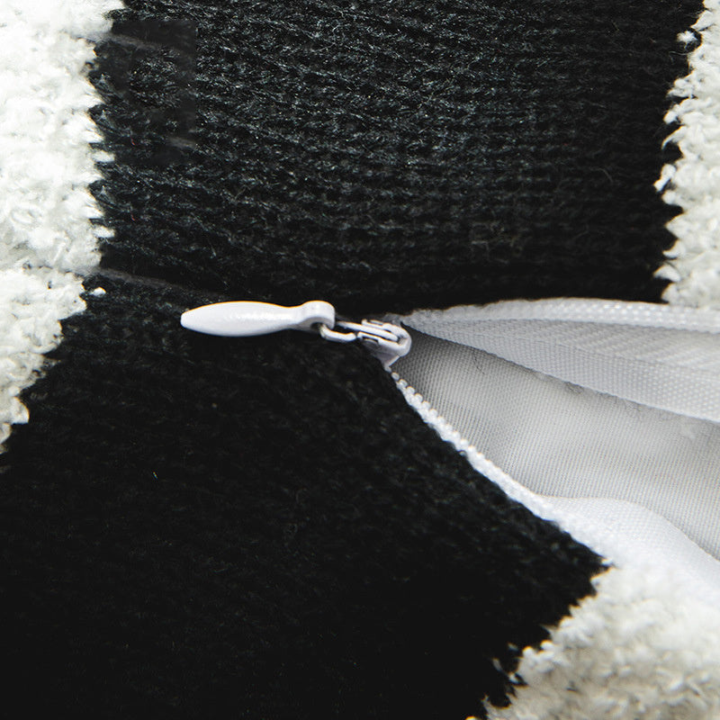 Close-up of the zipper on VibeCore Checkerboard Throw Pillow Cover, showcasing the sleek, concealed zipper design for a clean, seamless look. Made from a soft polyester-cotton blend, it’s both functional and stylish.