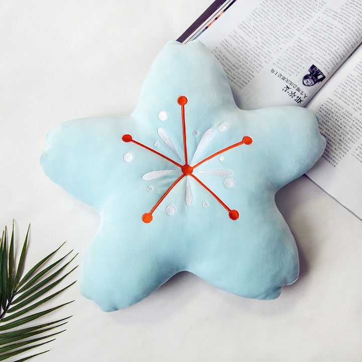 VibeCore Cherry Petal Throw Pillow in sky blue, showcasing a playful floral design made from soft plush PP cotton. A fresh, spring-inspired accent that adds a cozy pop of color and lively charm to your bed or couch.
