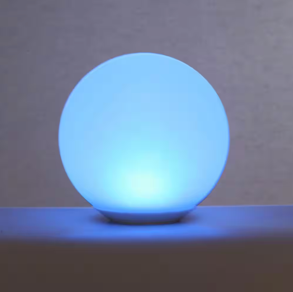VibeCore Color-Changing LED Glow Ball in blue, casting a cool, calming light to transform your space with dynamic color options.