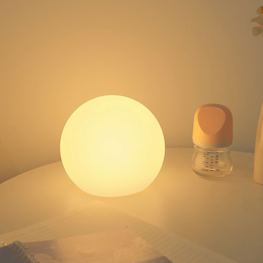 VibeCore Color-Changing LED Glow Ball in warm white, offering a soft, ambient glow, perfect for creating cozy and inviting lighting in any space.