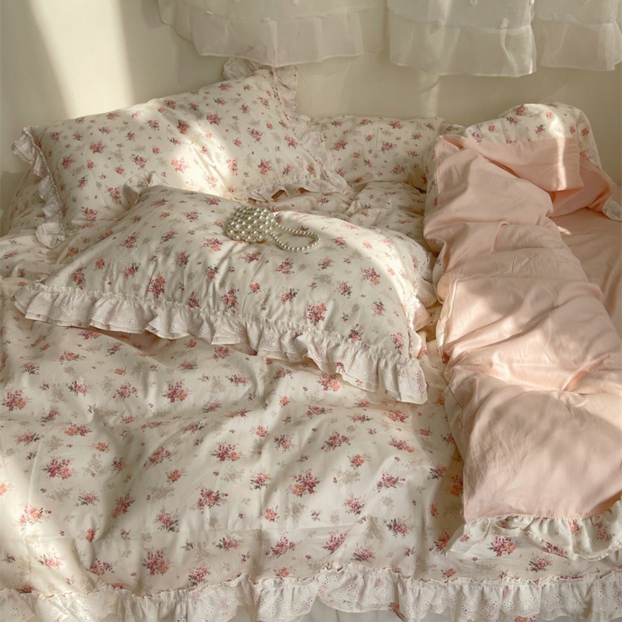 Pillows and pillow covers from the Embroidered Pink Floral Bedding Set, featuring soft cotton fabric and intricate pink floral embroidery. Perfect for enhancing your cozy, coquette bedroom decor with a vintage-inspired touch.