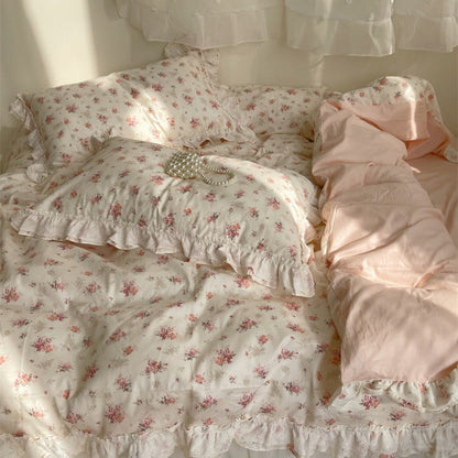 Pillows and pillow covers from the Embroidered Pink Floral Bedding Set, featuring soft cotton fabric and intricate pink floral embroidery. Perfect for enhancing your cozy, coquette bedroom decor with a vintage-inspired touch.