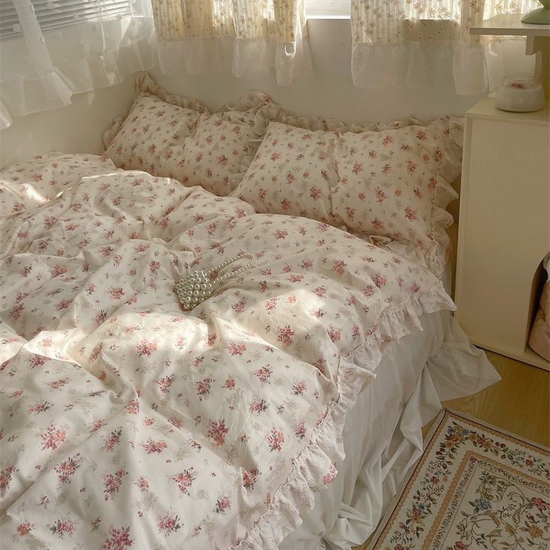 Embroidered Pink Floral Bedding Set that features a pink floral design and feminine embroidery. Bedding set that matches the coquette and cottagecore aesthetic.