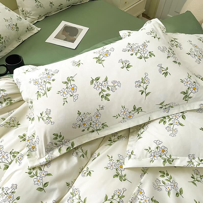 Close-up of the VibeCore Cottagecore Chamomile Flower Duvet Cover Set pillowcase, featuring a charming chamomile floral design on soft, breathable fabric for a cozy, aesthetic touch in your bedroom or dorm decor.