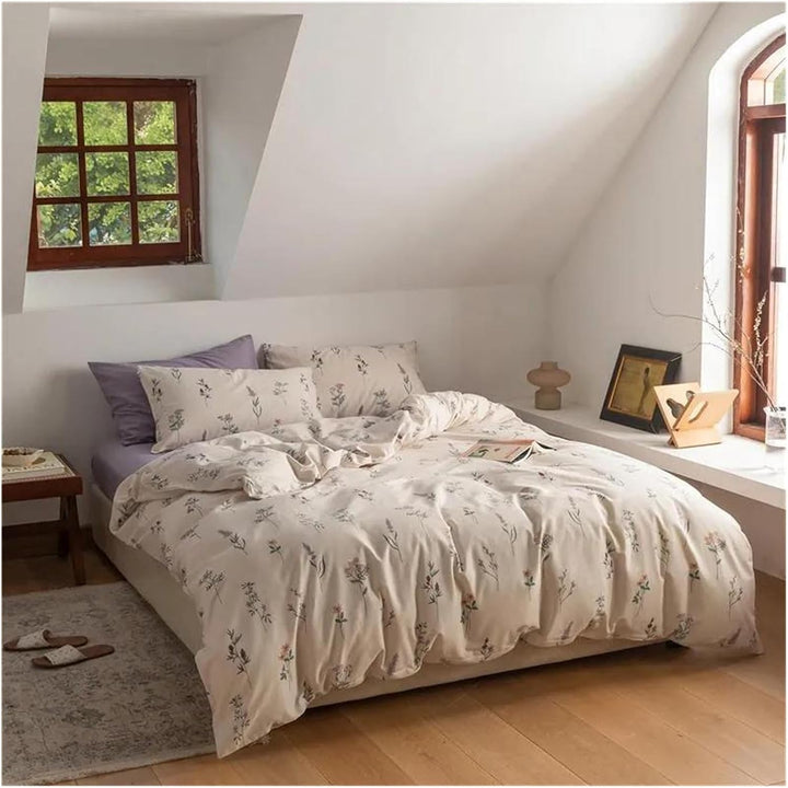Side aerial view of the VibeCore Cottagecore Gentle Blossom Duvet Cover Set, showcasing its delicate floral design on soft cotton fabric, perfect for creating a cozy, nature-inspired atmosphere in your bedroom or dorm.
