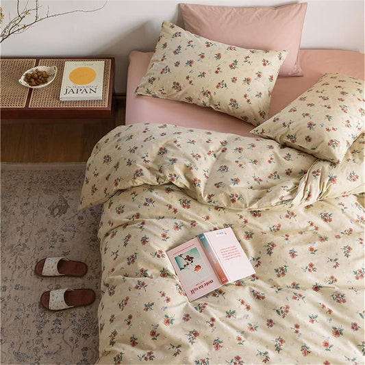 Aerial close-up of the VibeCore Cottagecore Vintage Floral Duvet Cover Set, featuring delicate vintage floral patterns on soft, cozy beige fabric, bringing timeless, vintage charm to your bedroom or dorm decor.