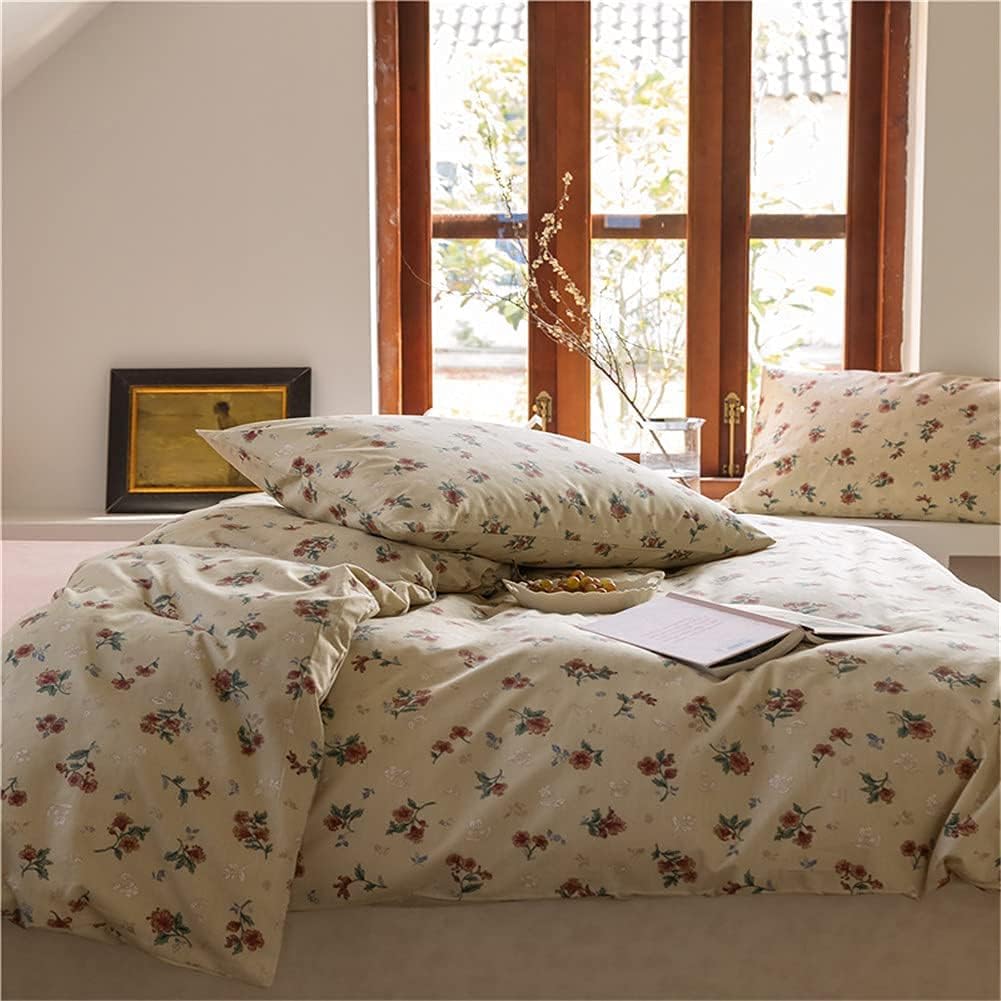 Close-up of the VibeCore Cottagecore Vintage Floral Duvet Cover Set pillowcase, showcasing a beautiful vintage floral pattern. The soft fabric and delicate design complement any rustic or cottagecore-inspired bedroom or dorm decor.
